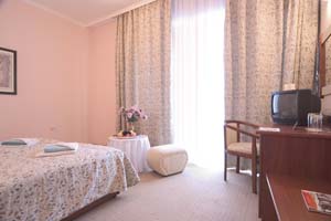 Basic double and 1 child with land view, balcony, private facilities (bath), and breakfast